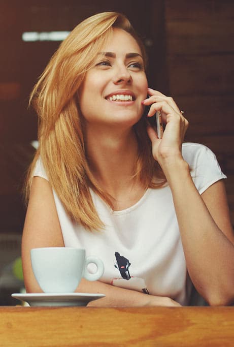 business loan broker with a coffee.