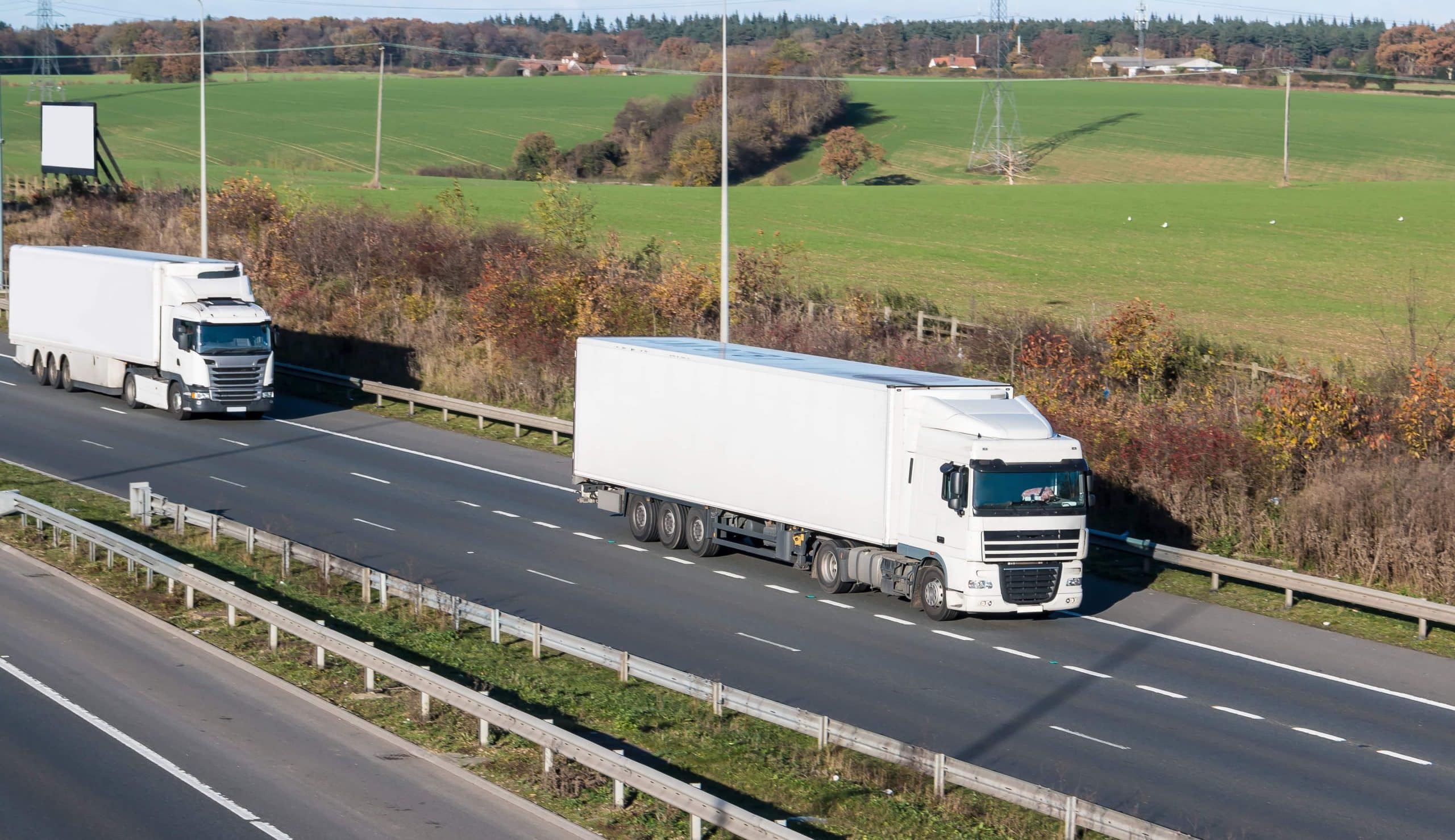Bespoke Commercial Finance haulage finance two lorries driving down the motorway
